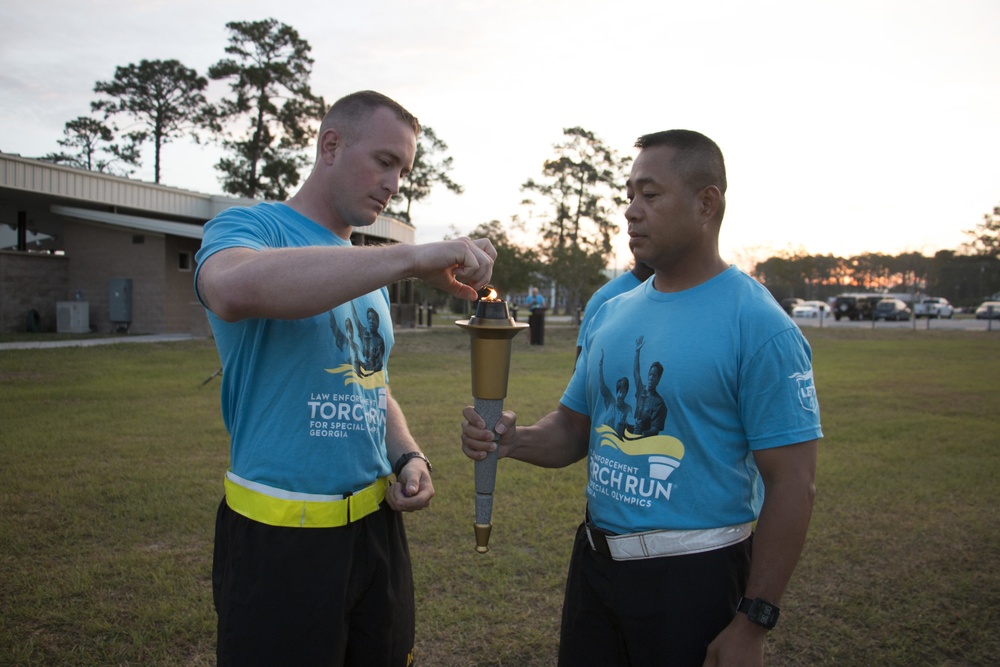 MPs, Local Law Enforcement light the way for GA Special Olympics