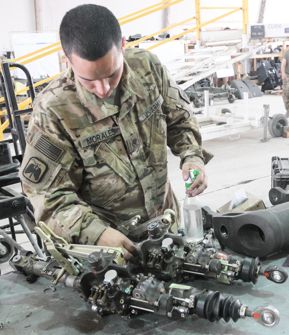 Soldier working on aircraft parts