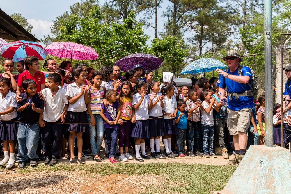 JTF-Bravo hikes over 5000 pounds of food and supplies to San Jerónimo, Comayagua, Honduras.