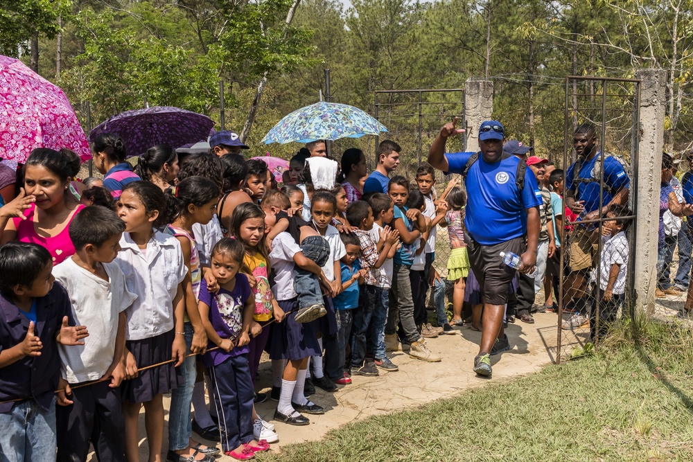 JTF-Bravo hikes over 5000 pounds of food and supplies to San Jerónimo, Comayagua, Honduras.