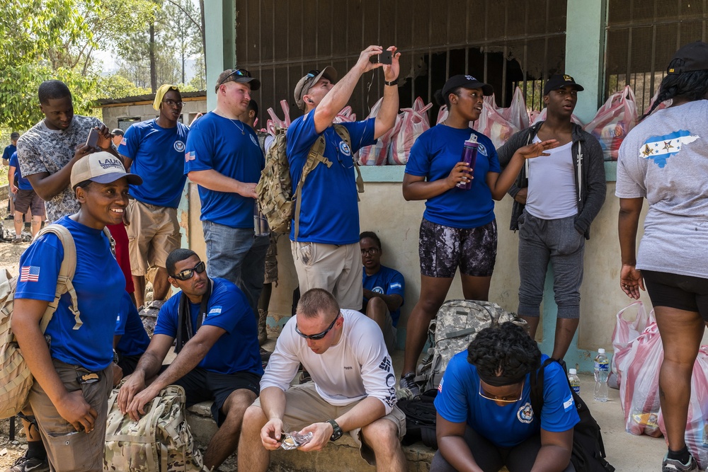 JTF-Bravo hikes over 5000 pounds of food and supplies to San Jerónimo, Comayagua, Honduras.