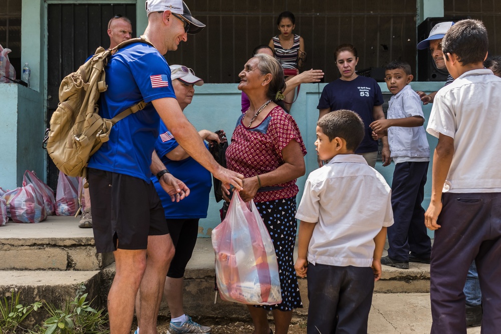 JTF-Bravo hikes over 5000 pounds of food and supplies to San Jerónimo, Comayagua, Honduras.