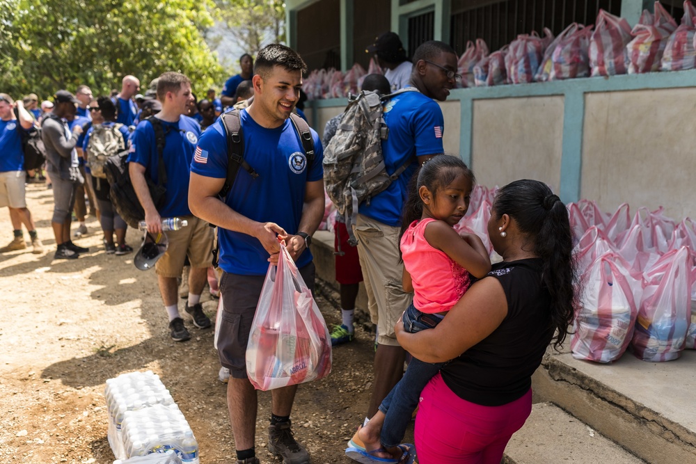 JTF-Bravo hikes over 5000 pounds of food and supplies to San Jerónimo, Comayagua, Honduras.