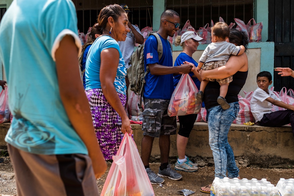 JTF-Bravo hikes over 5000 pounds of food and supplies to San Jerónimo, Comayagua, Honduras.