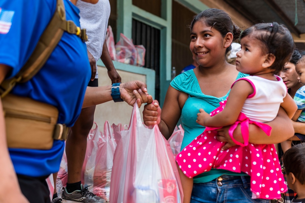 JTF-Bravo hikes over 5000 pounds of food and supplies to San Jerónimo, Comayagua, Honduras.