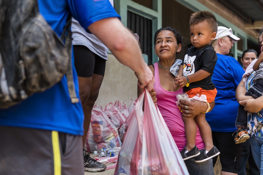 JTF-Bravo hikes over 5000 pounds of food and supplies to San Jerónimo, Comayagua, Honduras.