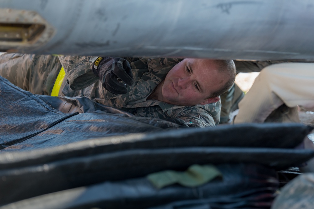 Aircraft maintainers practice recovering fighter aircraft