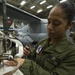 Marine on USS America conducts maintenance