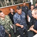 Rear Adm. Stephen Williamson toured USS Emory S. Land (AS 39) and other repair facilities in Guam to assess current operations and capabilities.