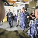 Rear Adm. Stephen Williamson toured USS Emory S. Land (AS 39) and other repair facilities in Guam to assess current operations and capabilities.