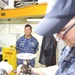 Rear Adm. Stephen Williamson toured USS Emory S. Land (AS 39) and other repair facilities in Guam to assess current operations and capabilities.