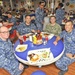 Rear Adm. Stephen Williamson toured USS Emory S. Land (AS 39) and other repair facilities in Guam to assess current operations and capabilities.