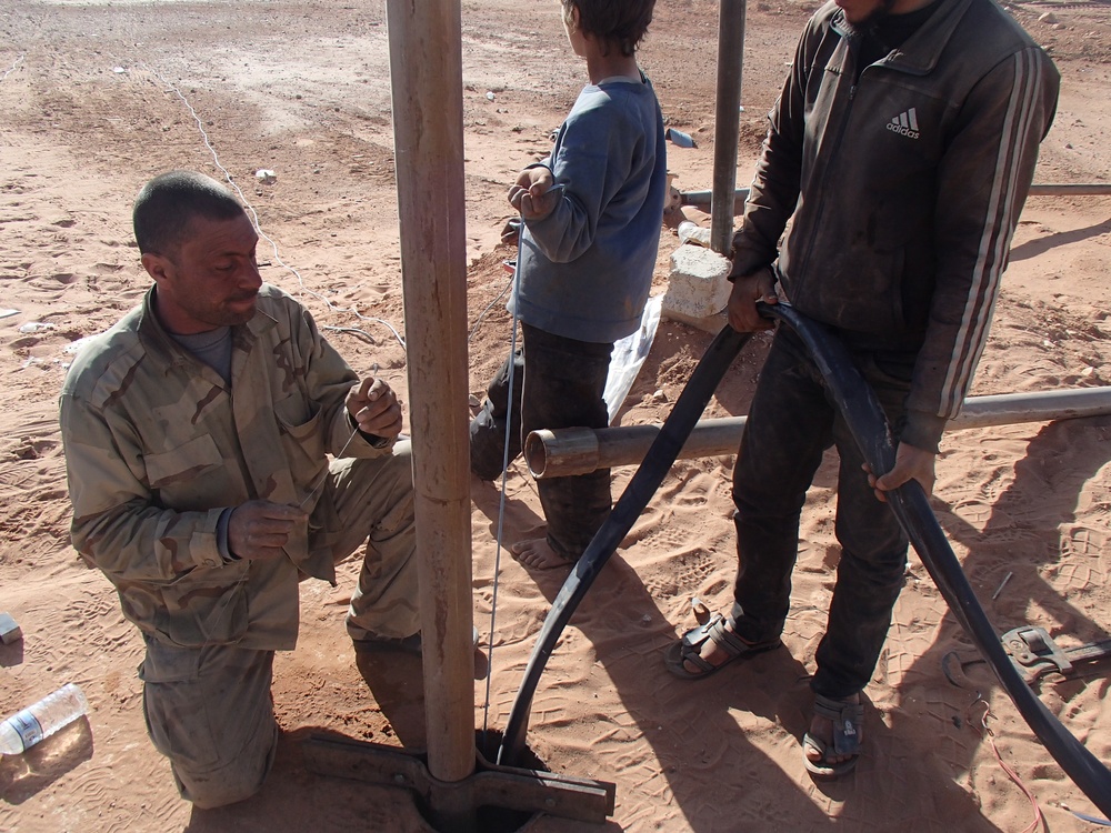 Coalition and partnered forces repair At Tanf water well