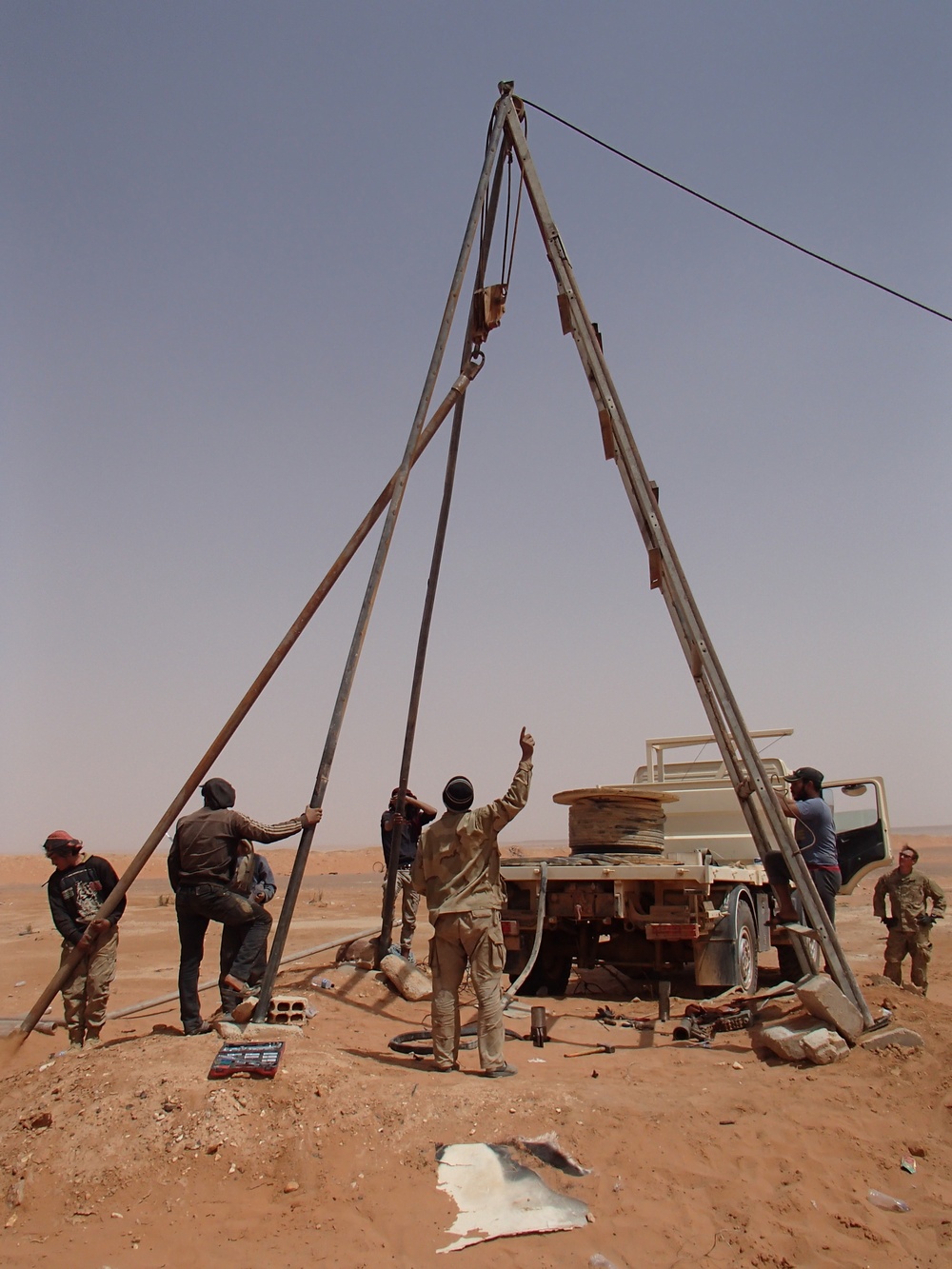 Coalition and partnered forces repair At Tanf water well