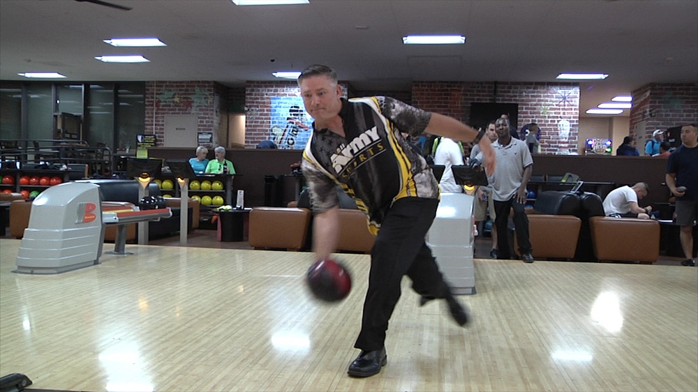 Coach (Capt.) Scott Lentsch leads the way for All Army Bowling Team