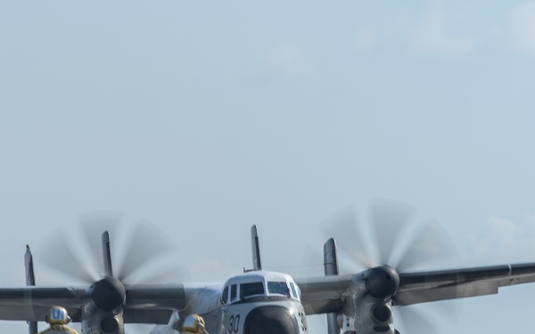 CVW-5 aircraft fly aboard
