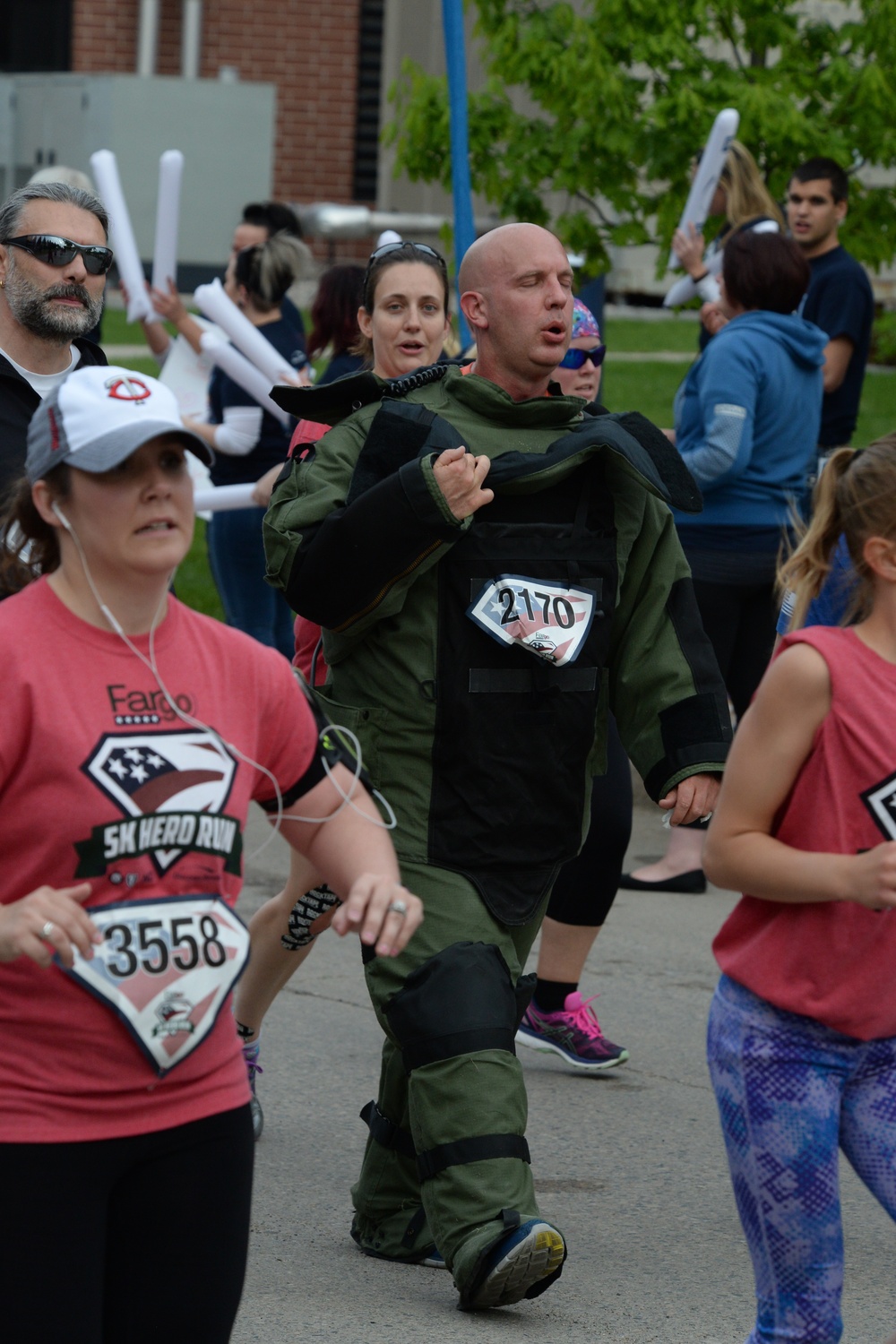 119th Wing EOD technician runs 5k in bomb protection suit