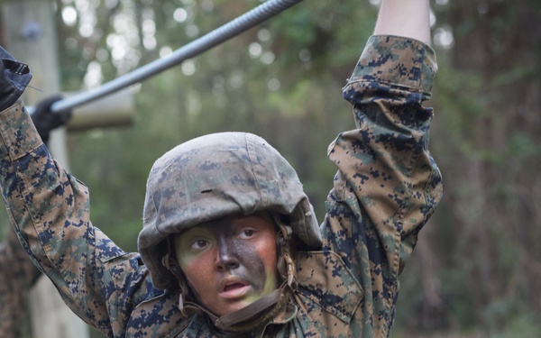 Oscar and Golf Company go through the Combat Endurance Course