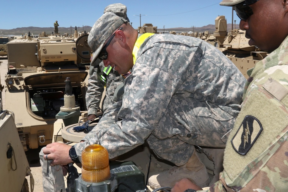 A Day of Lasers: 155th ABCT attaches MILES gear to tracked vehicles