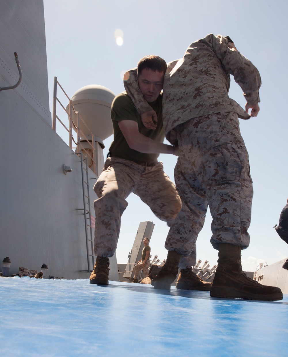 Combat Cargo Marine tests out for MCMAP gray belt