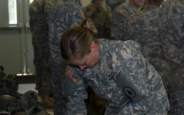 Soldier Prepares Ruck Sack