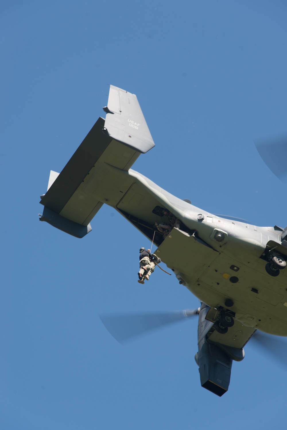 SOCEUR U.S. Sailors and Airman train insertion and extraction techniques utilizing an MV-22 Osprey