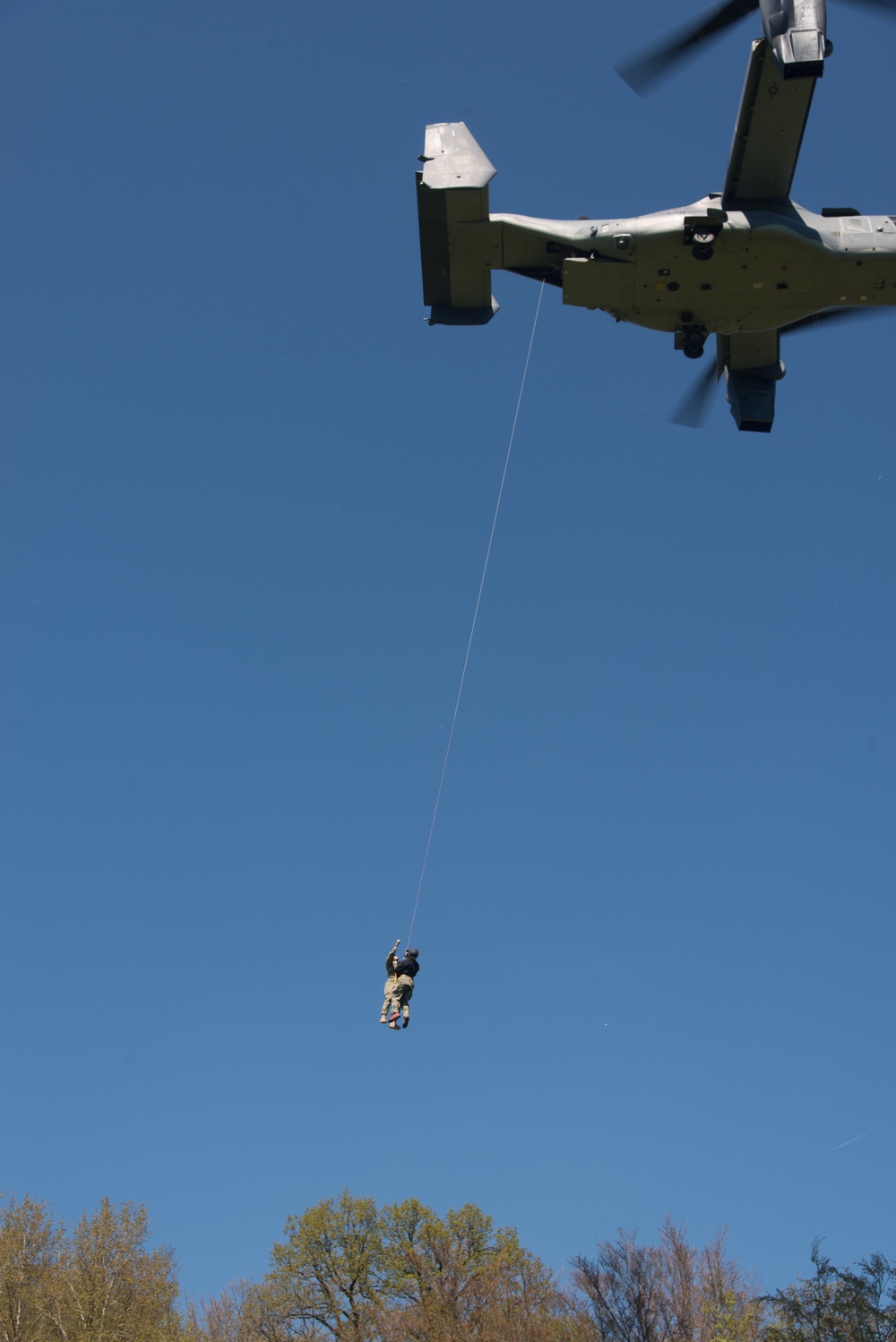 SOCEUR U.S. Sailors and Airman train insertion and extraction techniques utilizing an MV-22 Osprey