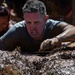 Old Ironsides Mud Challenge Soldiers, friends and family dive in