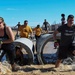 Old Ironsides Mud Challenge Soldiers, friends and family dive in