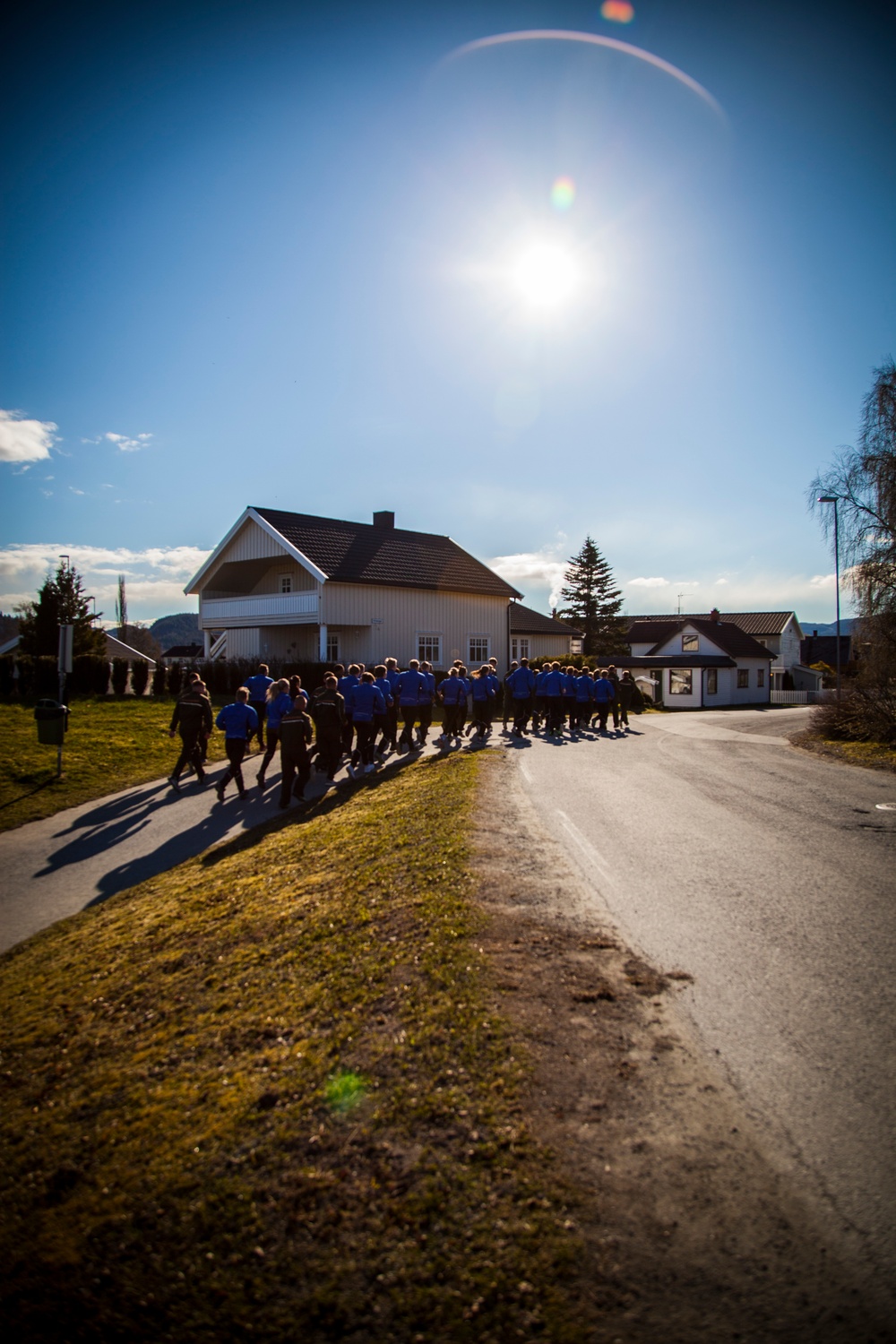 Up in the morning with the Norwegian sun: U.S. Marines and Norwegian soldiers conduct moto run