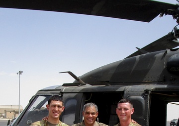 Blackhawk crew chiefs receive combat patch from U.S. Army Central Commanding General