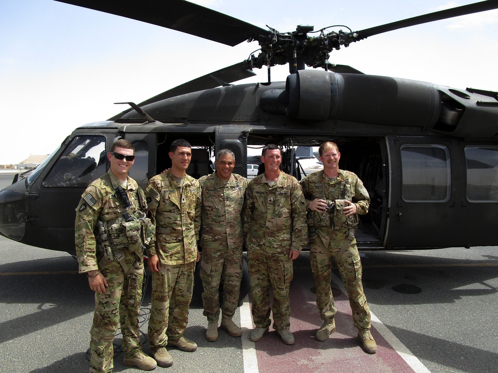 Blackhawk crew chiefs receive combat patch from U.S. Army Central Commanding General