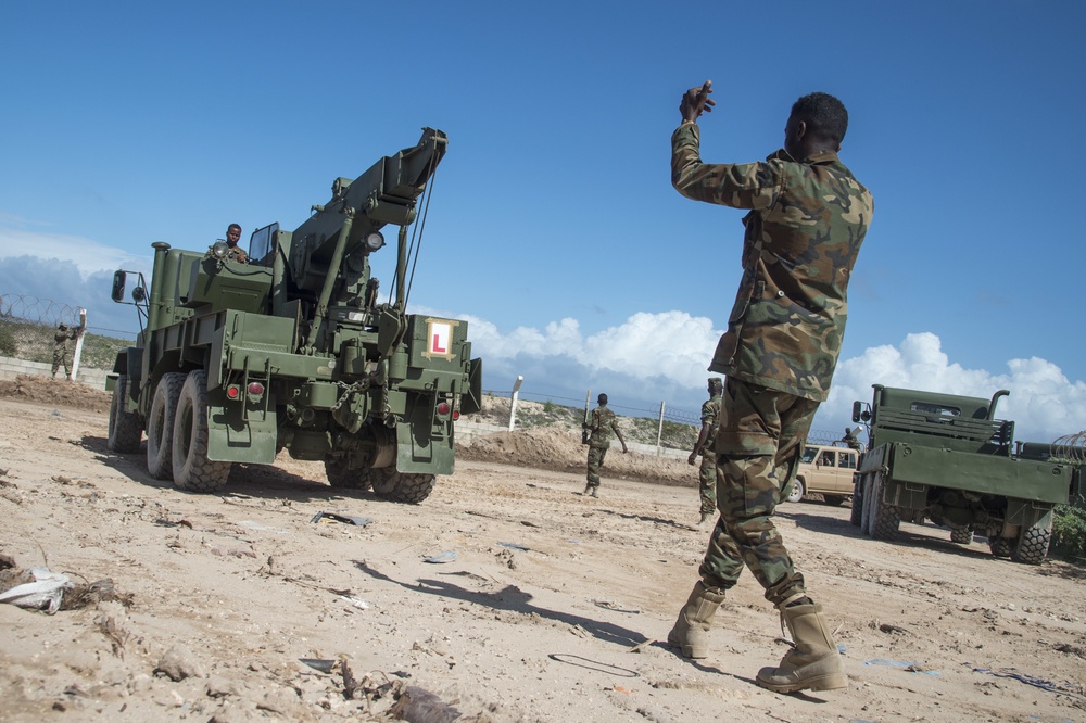 AFRICOM trainers share logistics expertise with Somali National Army partners, first class graduates