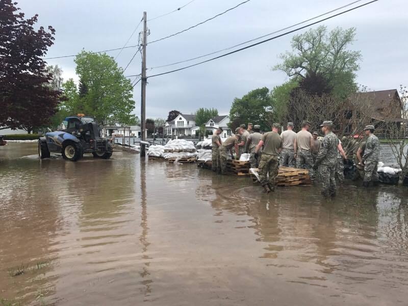 NY National Guard's 105th MP Company conducts sandbag operations at Sodus Point