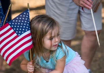 Little girl and American flag