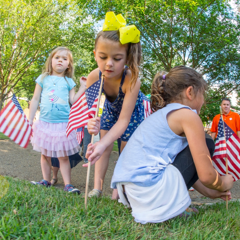 Little girls and American flags