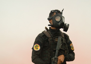 CTS soldier stands gaurd