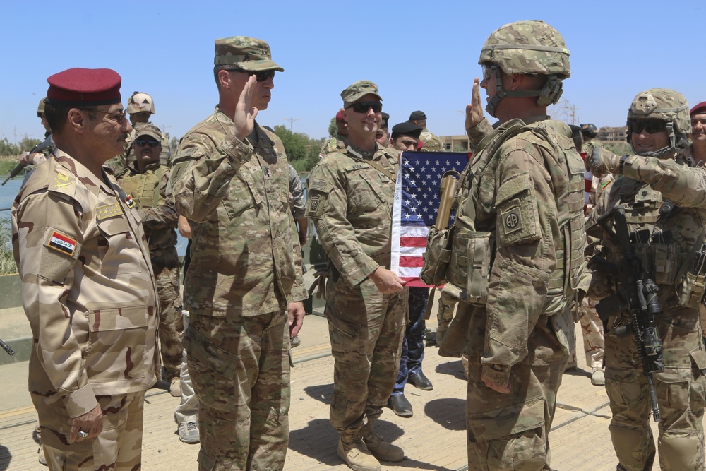 U.S. Army Paratrooper promoted by CJFLCC commander, Maj. Gen. Joseph Martin