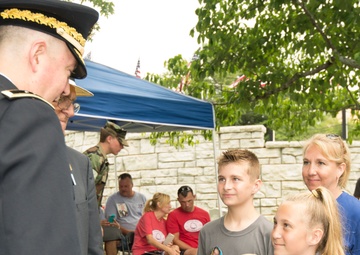 MG Stephen Farmen Speaks with Children