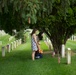 Memorial Flowers Foundation Volunteers Lay Roses at Headstones
