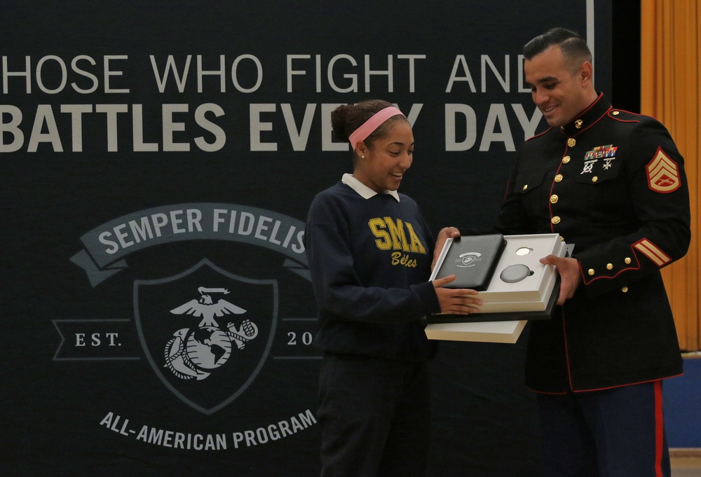 Natalie Crockenberg congratulated as Marine Corps' Semper Fidelis All-American