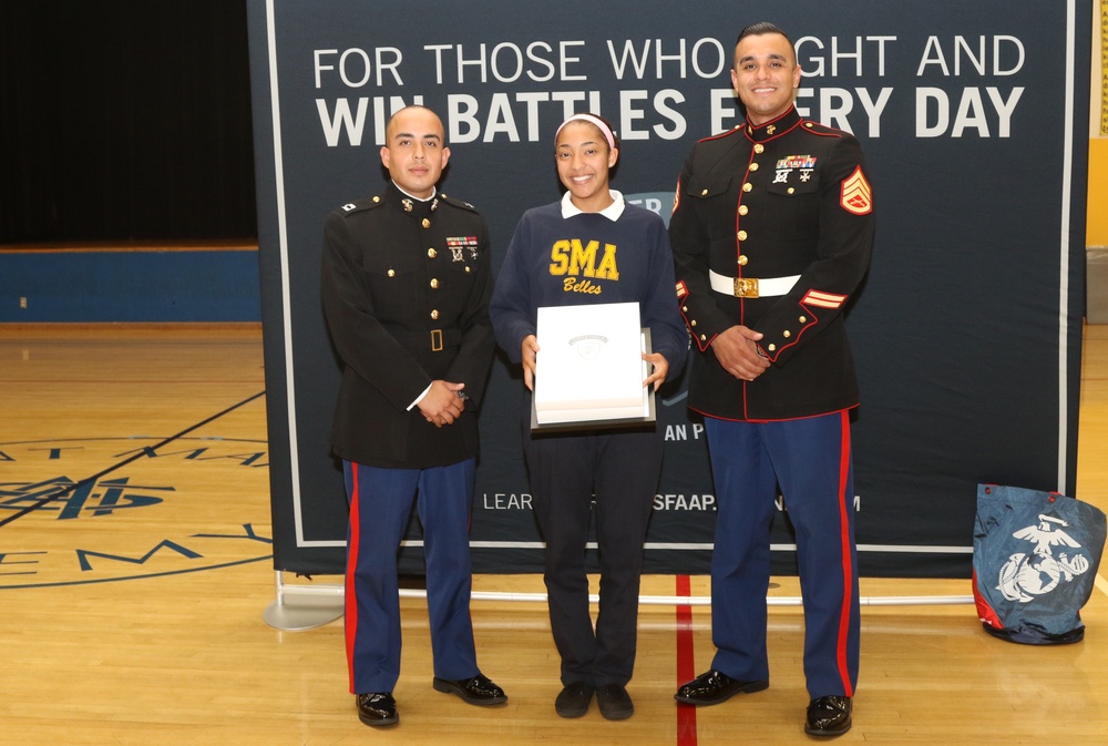 Natalie Crockenberg congratulated as Marine Corps' Semper Fidelis All-American