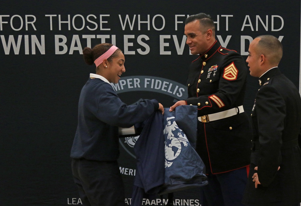 Natalie Crockenberg congratulated as Marine Corps' Semper Fidelis All-American