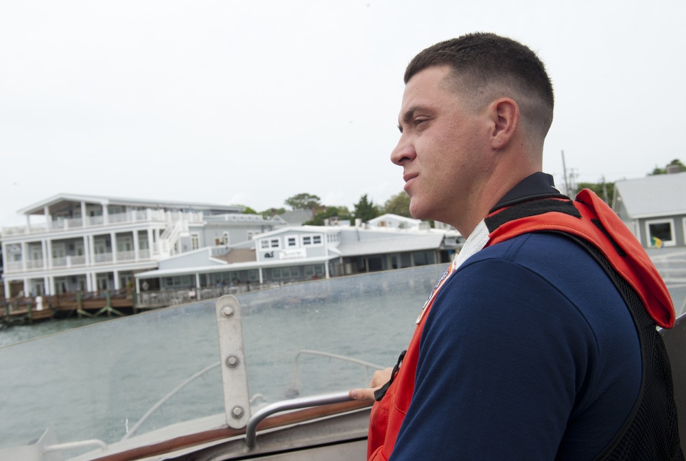 Coast Guardsman receives medal in Atlantic Beach, NC, for saving 5 lives