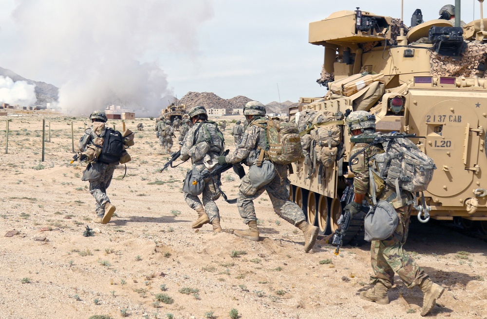 Kansas Guardsmen conduct combined arms assault training at NTC