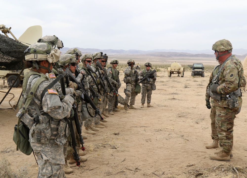 Maj. General Michael Zerbonia, the assistant adjutant general - Army of Illinois, greets Soldiers at NTC