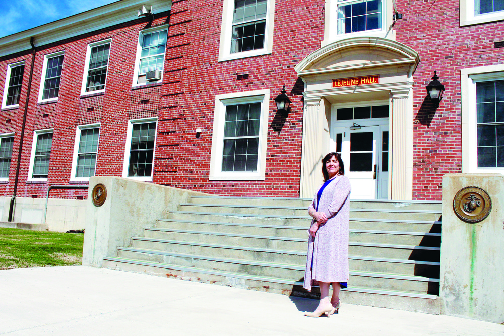 Marcia Flangan stands in front of LeJeune Hall