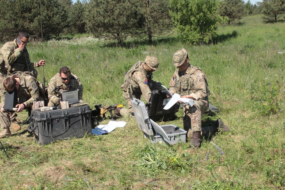 U.S. and U.K. soldiers put “The Eye In The Sky” during a joint UAV mission