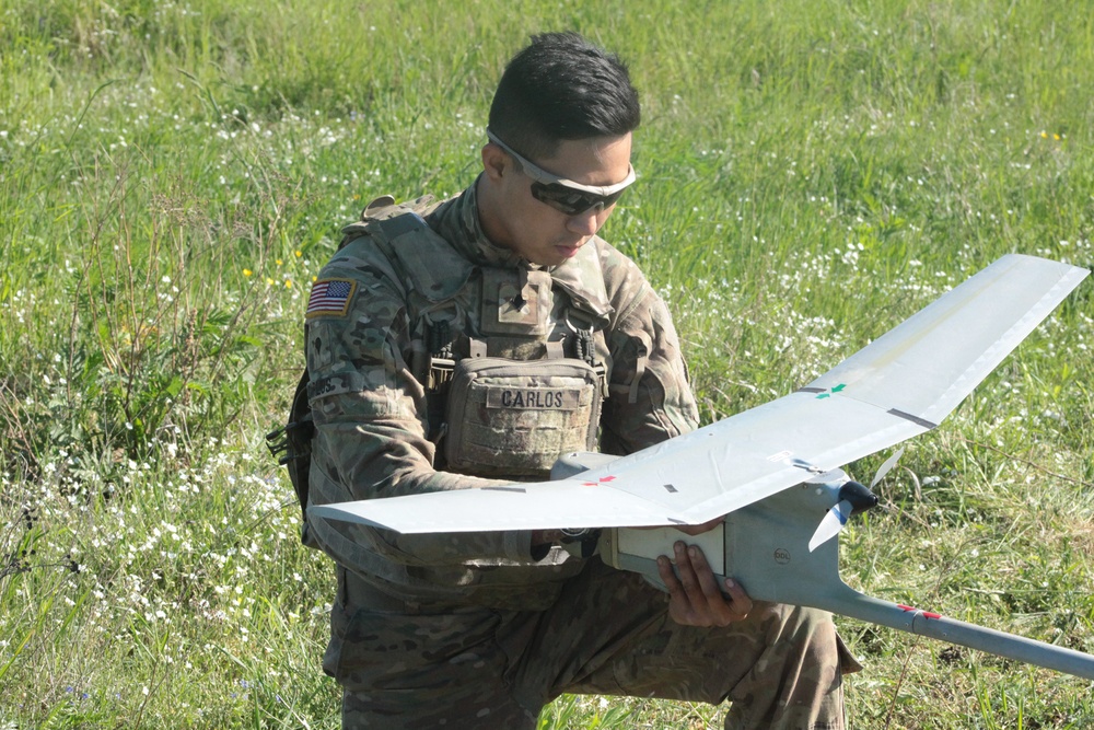 U.S. and U.K. soldiers put “The Eye In The Sky” during a joint UAV mission