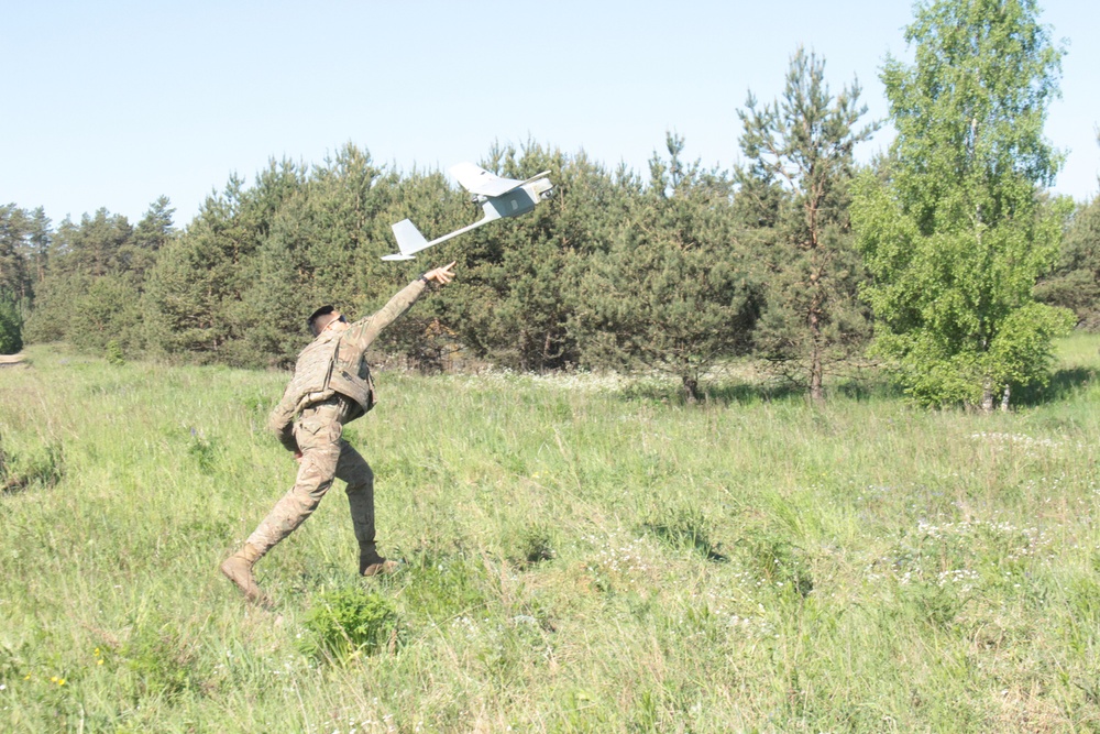 U.S. and U.K. soldiers put “The Eye In The Sky” during a joint UAV mission